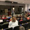 Speaking to middle school students on the importance of literacy. 